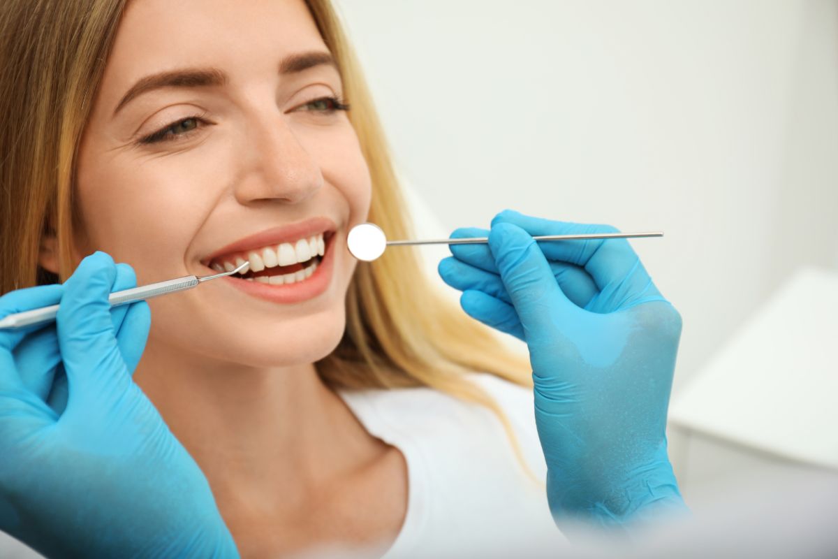 Patient receiving cosmetic dental care for tooth gaps in Kernersville