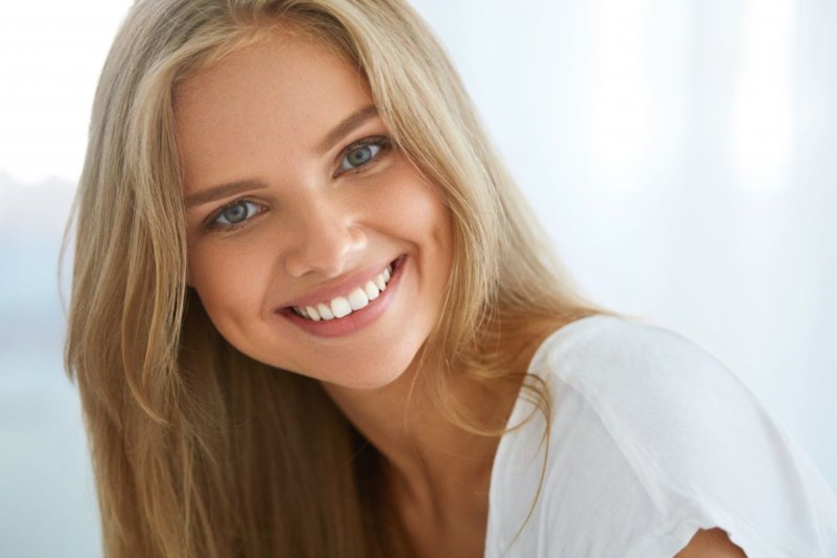Smiling girl showing a bright and confident smile