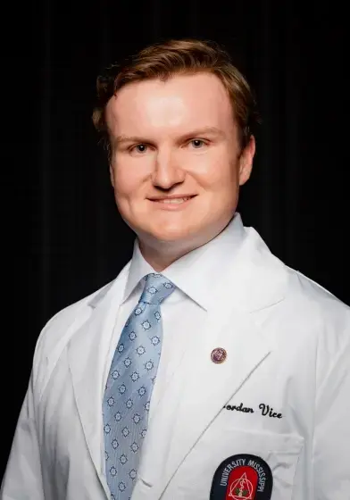 Dr. Jordan Vice, dentist at Kernersville dental practice, in professional portrait.
